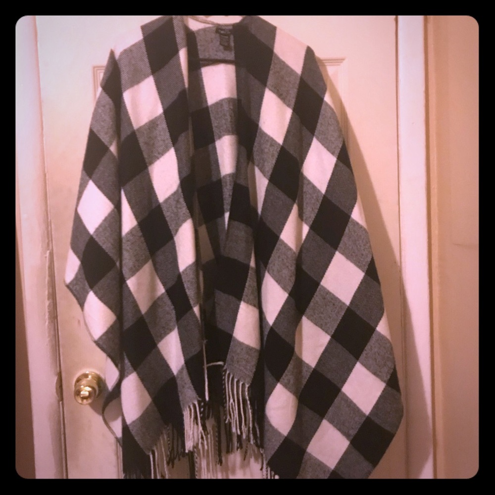 Black and white and red and black ponchos